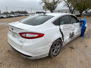 2015 Ford Fusion Hybrid Titanium - Exterior Rear Right Corner Image